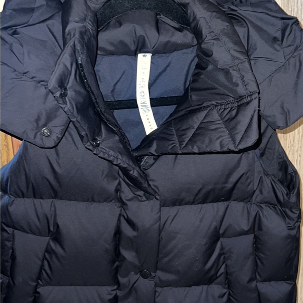 Women’s Lululemon down vest, never worn, size 2